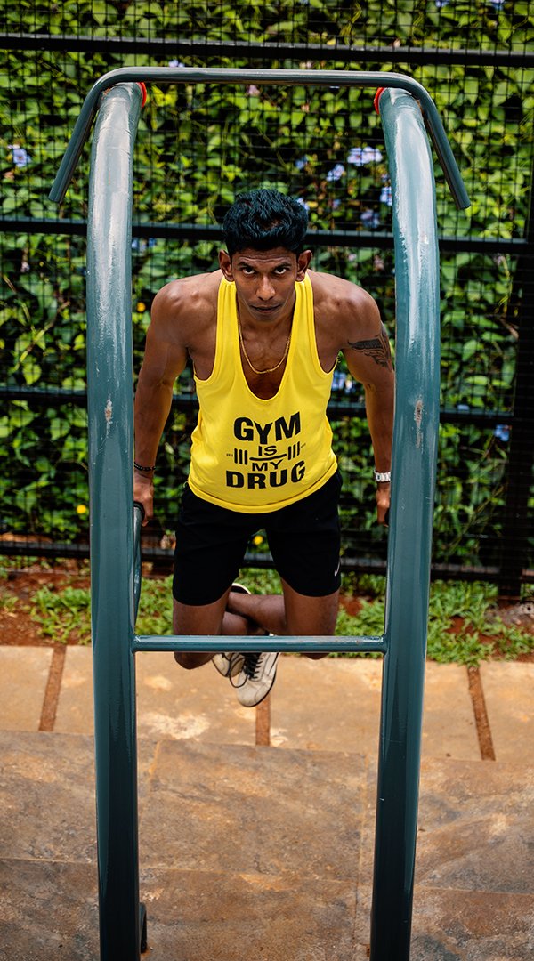 Resort in Munnar - Guest doing workout in outdoor gym